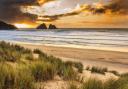 Sunset over Holywell Bay Beach