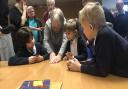 Michael Lefevre, Christine Monery and Derek Berresford with pupils from Royal School for the Deaf Derby