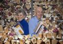 Sarah and Mark Downey, founders of Dorset-based business Epic Print, holding some of their Coffeenotes range of stationery created from recycled paper coffee cups