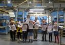 Nick Goldsmith with the after-school newspaper club The Vault visiting the printers  to see the first issue of their quarterly subscription based newspaper What's Going On? Mattie, Sara, Austyn, Niamh, Phoebe, Tally, Tom, Alice and Daniel