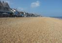 Plenty of space for sunbathing on Deal beach - just bring a firm mat to lie on if you don't want those pebbles digging into your back