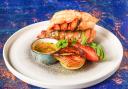 We couldn't resist ordering the lobster tail, chargrilled and served with garlic butter. John Allen photography