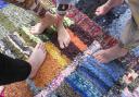 A colourful rug made from recycled yarn
