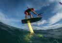 A kite surfer on a hydrofoilkite