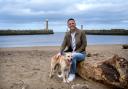 Stopping off on the sand - David in Whitby with his rescue dog Kai