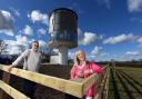 Angela and Chris Hudson outside Flockton water tower near Huddersfield, which they have converted into a home for holiday lets.