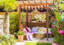 Summer garden with brightly coloured furnishings illustrating Fun Fusion trend