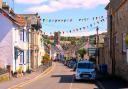 Take a break from traversing the moor in this welcoming town.