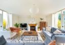 Spacious sitting room with woodburner at Byre House. ( Photo: dorset Hideaways)