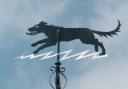 The Black Shuck weather vane in Bungay