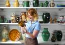 Mary Chilcott with some Fishley pottery.