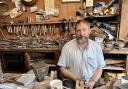 Silversmith Julian Hart, surrounded by tools his great grandfather George Hart would have used 100 years ago