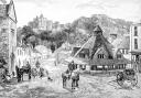 Dunster's Yarn Market with Dunster Castle in the background as illustrated in 1891. Photo: Getty