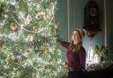 The team decorates the house in a previous year. Photo: SG Haywood Photography/ National Trust