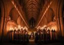 Wells Cathedral Choir sing seasonal classics by candlelight. Photo: Jason Bryant.