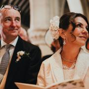 Dr Dawn Harper and Jack Harries take their vows at Duntisbourne Abbots church