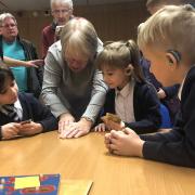 Michael Lefevre, Christine Monery and Derek Berresford with pupils from Royal School for the Deaf Derby