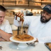 Riath and his traditional honey cake. (c) Balqees