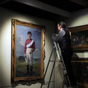 Portrait of Warrington-born jockey Steve Donoghue at the town's museum being unveiled in 2017. (c) Warrington Guardian