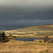 Wintry skies over the tarn.