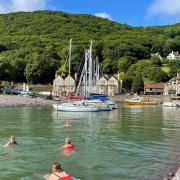 Porlock Weir at high tide is a popular place for a swim.