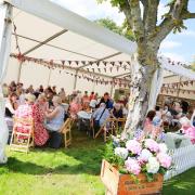 Visitors to last year's show enjoy afternoon tea.