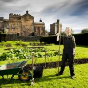 Janet Queen at work in the garden at Rose Castle