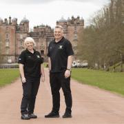 Mark and Lesley on the famous driveway to the 'pink palace' of Drulmanrig