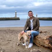 Stopping off on the sand - David in Whitby with his rescue dog Kai