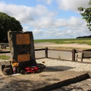 Memorial stone at the entrance to Tarrant Rushton airfield.