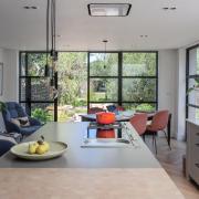 New Kitchen-dining room: The builders put in a skylight then fitted a handmade kitchen from Davonport Kitchens of Colchester with worktops of marble, silestone and timber