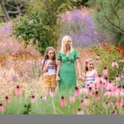 Sienna Marsh (9) and sister Scarlett (6) pictured with mum Lauren (36) from Tonbridge, admire the pathways of Diana's Walk prairie garden