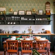 Open shelving in the kitchen shows of some of Antony's finds.