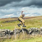 Taken from the book, Annie's image of Under Keeper Thomas Wilkinson at Scargill showing his athleticism in vaulting the boundary wall!