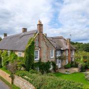 Benville House viewed from the quiet country lane that runs by.