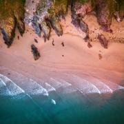 Sea and sand at Bigbury Bay where Beth's coastal painting adventure began.