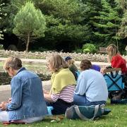 Drawing On artists at work next to the pond in Collett Park