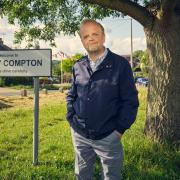 Toby Jones as Alan Bates.