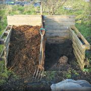 Compost bay made from old wooden pallets