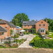 Look at this spacious Hampshire home with an outdoor swimming pool, now on the market