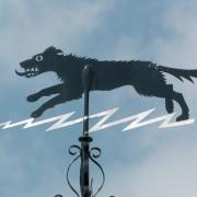 The Black Shuck weather vane in Bungay