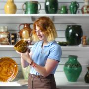 Mary Chilcott with some Fishley pottery.