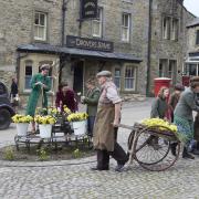 Filming at Grassington in th Yorkshire Dales which becomes the fictioou Darrowby in All Creatures Great and Small.