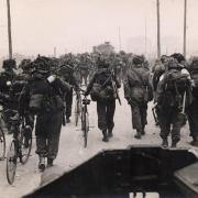 Soldiers going inland after landing on the beaches of Normandy, June 6/7, 1944. These men are thought to be from 'B' Company, 2nd Battalion, the Gloucestershire Regiment, led by Major R. Stephens. Pic: Soldiers of Gloucestershire Museum