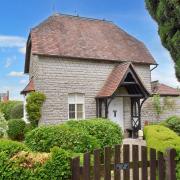 The grade II-listed cottage in Upton Cemetery.