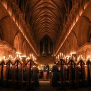 Wells Cathedral Choir sing seasonal classics by candlelight. Photo: Jason Bryant.