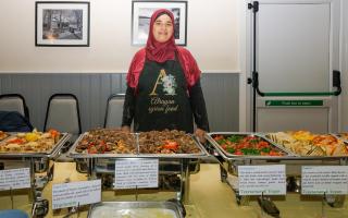 Manal with her array of dishes from her home country at a Syrian Supper event by Alrayan Food..