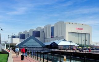 The Dock Museum stands next to Barrow's BAE Hangars