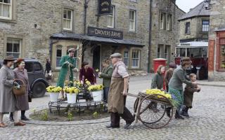 Filming at Grassington in th Yorkshire Dales which becomes the fictioou Darrowby in All Creatures Great and Small.