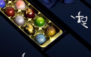 XO's high gloss chocolates are made to look like a vibrant box of jewels.